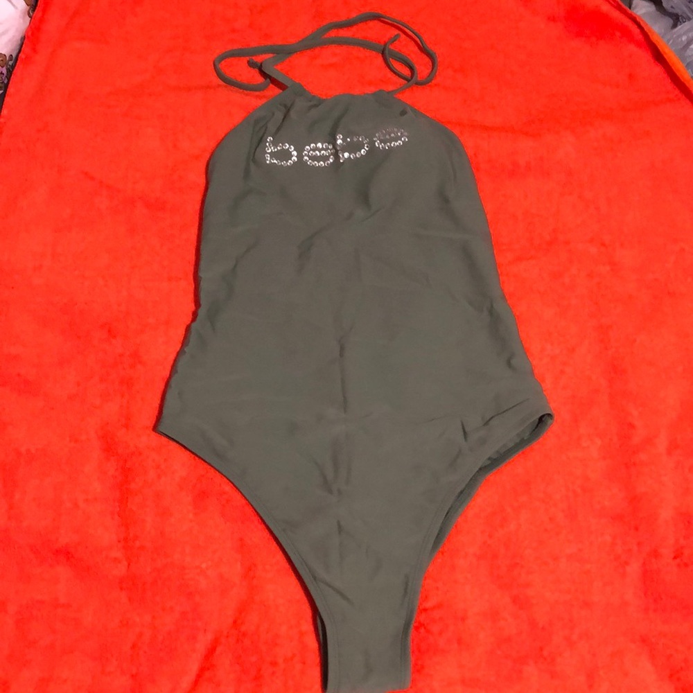 Olive green bebe one piece bathing suit. Size S